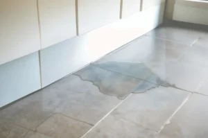 signs of water damage under tile
