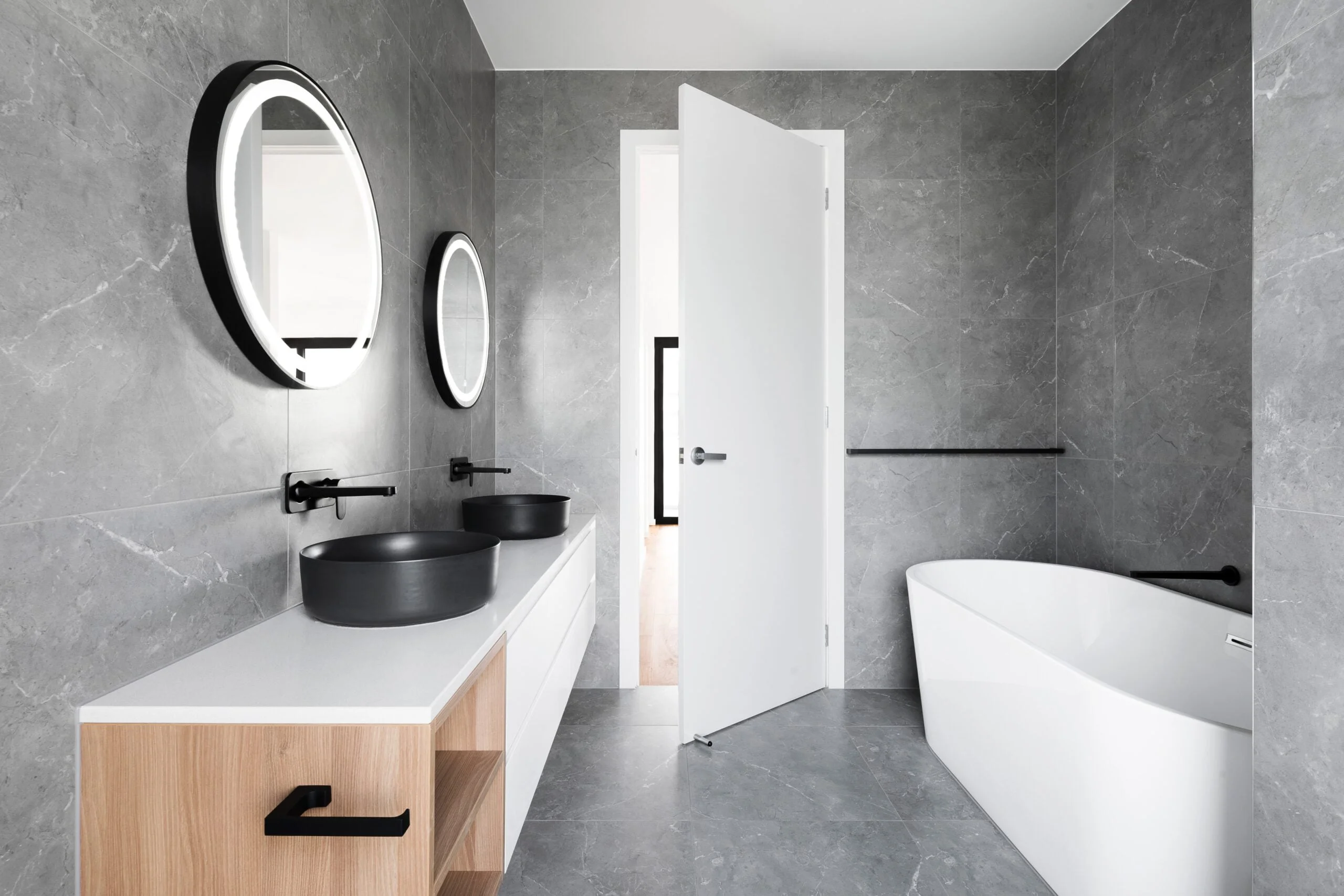 Bathroom water damage is caused by leaky tubs and toilets and burst pipes.